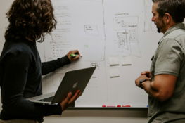 man-wearing-gray-polo-shirt-beside-dry-erase-board.jpg man wearing gray polo shirt beside dry-erase board